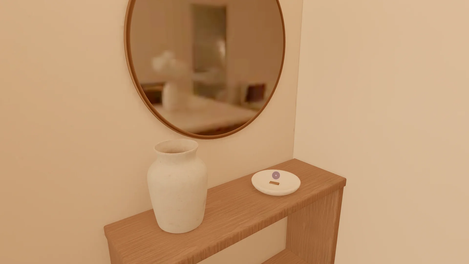 L’entrée : console en chêne, coupelle à clés, vase et miroir rond en laiton.